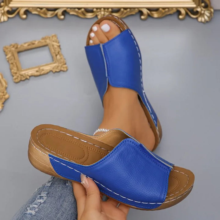 Versatile women's walking wedge sandals, easy slip-on platform design for everyday comfort & outdoor use.