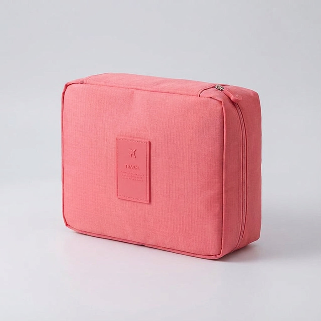 Women's compact toiletry bag, portable waterproof cosmetic organizer for travel makeup storage.