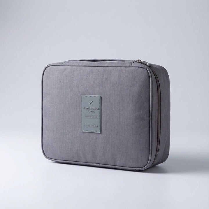 Functional women's travel cosmetic bag, compact waterproof organizer for makeup & toiletries.