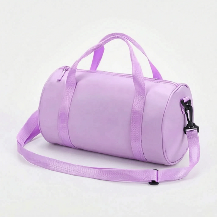 Women's activewear duffel bag, compact & water-resistant, designed for the modern woman on the go.