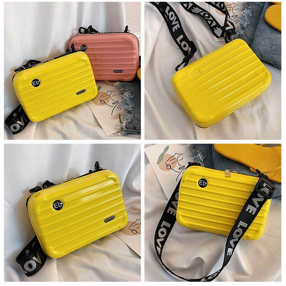 Chic women's hard shell crossbody bag. Fashionable compact mini handbag for modern women on the go.