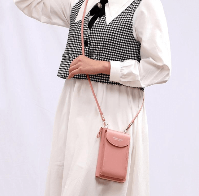 Elegant women's small PU leather handbag, adjustable strap, for fashion-forward looks.