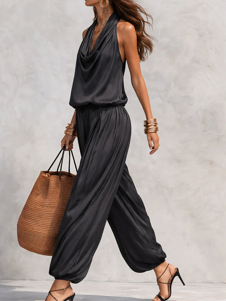 Elegant women's two-piece set with a draped cowl neck halter top & wide leg pants for chic evening wear.
