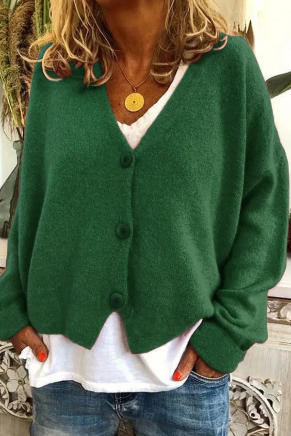 Stylish women's long sleeve button cardigan, ideal layering piece for fall & winter outfits.