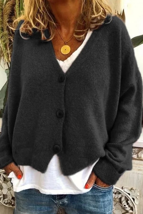 Soft knit women's button-front cardigan, a cozy sweater for comfy everyday wear.