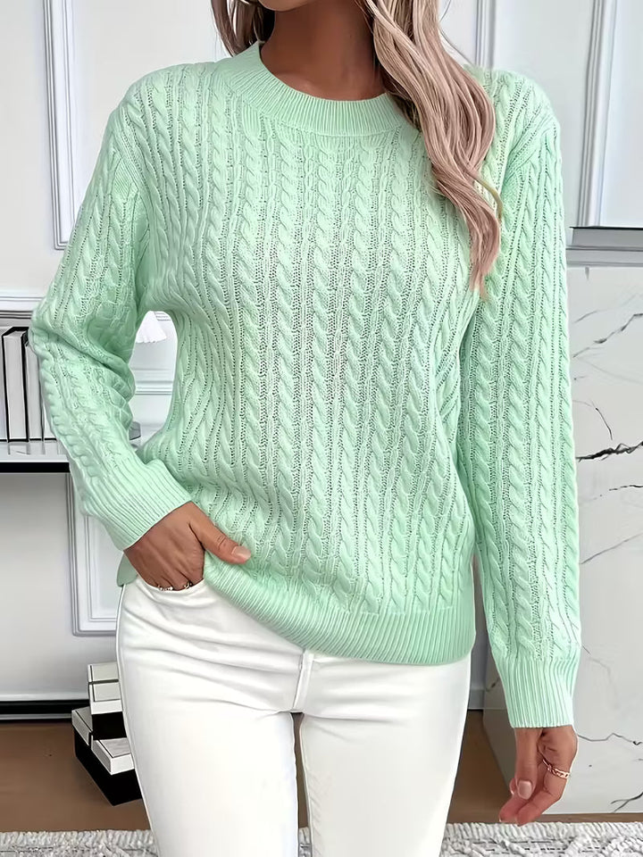 Soft, comfortable women's cable knit crew neck jumper. Ideal cozy long sleeve knitwear for autumn.