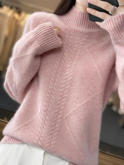 Cozy women's turtleneck sweater with intricate cable-knit design, offering warm comfort for cold weather.