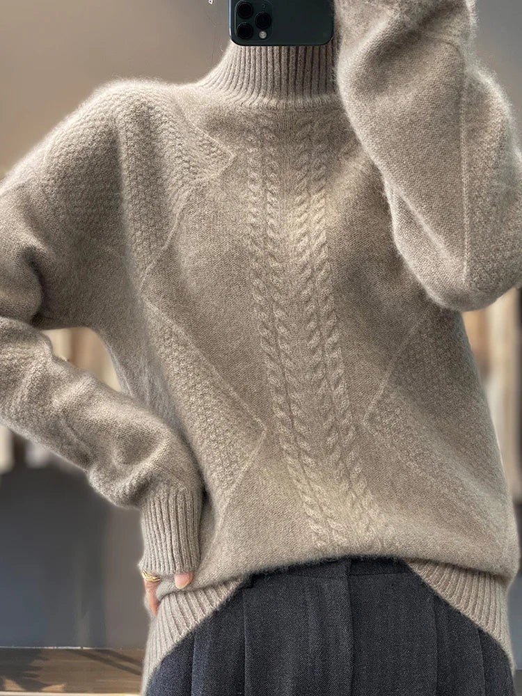 Women's warm apparel: comfortable cable-knit turtleneck sweater with long sleeves for cozy everyday style.