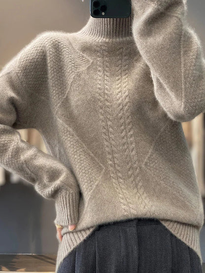 Women's warm apparel: comfortable cable-knit turtleneck sweater with long sleeves for cozy everyday style.