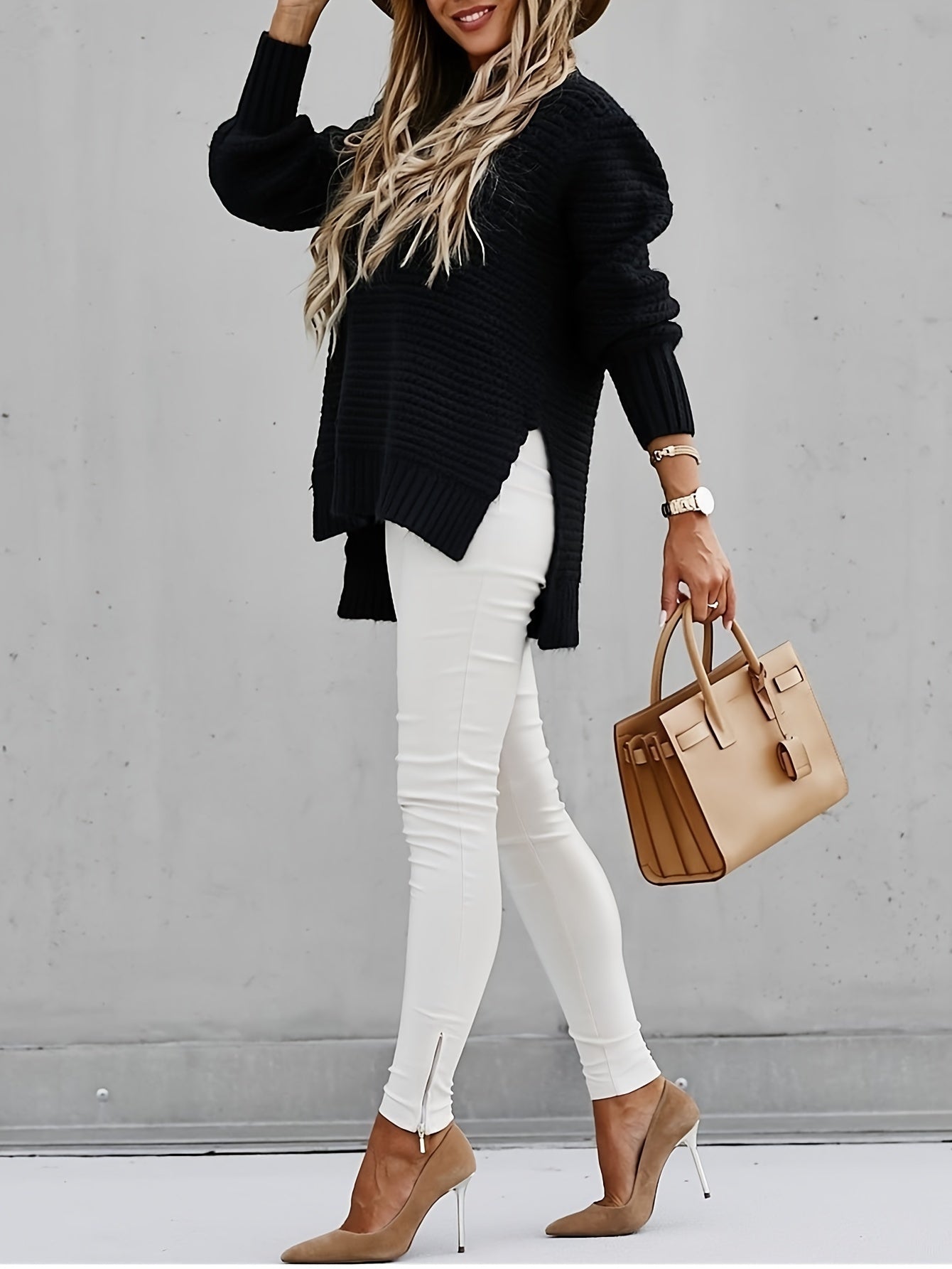 Soft chunky knit oversized women's sweater, offering a relaxed fit for ultimate coziness.