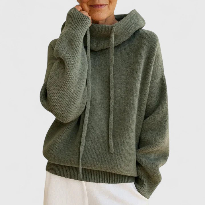 Women's cozy drawstring cowl neck pullover sweater in a relaxed fit. Perfect for fall and winter casual wear.