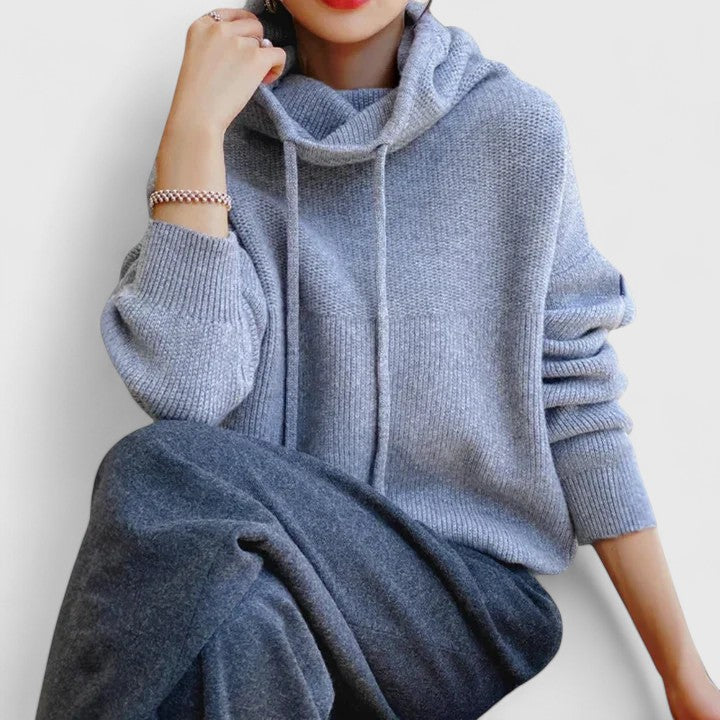 Warm & cozy women's sweater. Relaxed fit, long sleeve pullover with a comfy drawstring cowl neck for everyday wear.