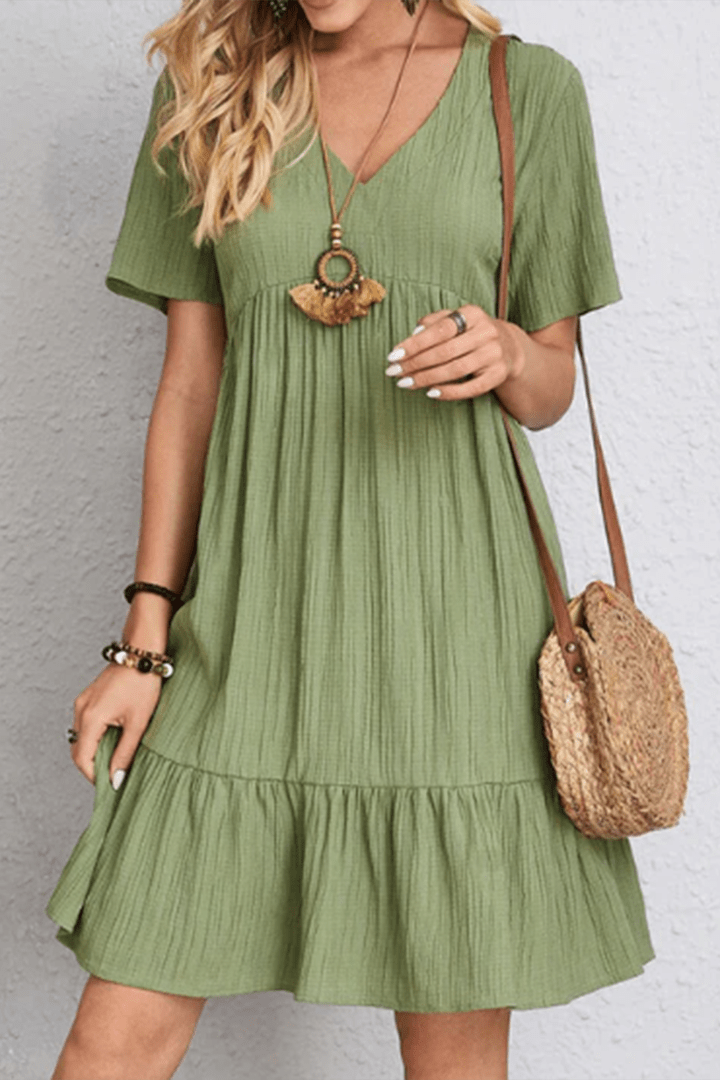 Relaxed fit women's summer midi dress, offering effortless comfort for casual day-to-night outfits.