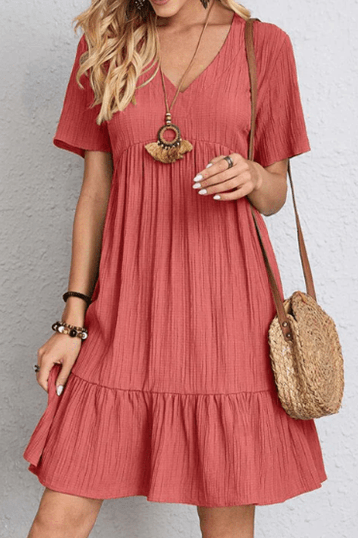 Elegant women's midi dress with a relaxed fit for chic, comfortable everyday fashion and summer travel.