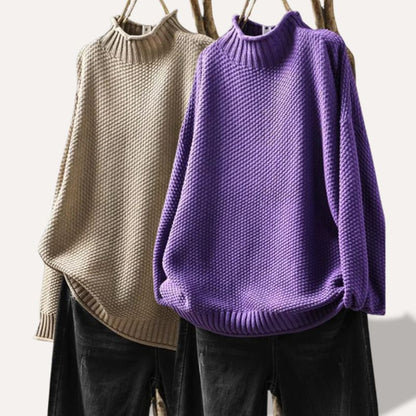 Women's cozy pullover sweater, long sleeve, comfortable and versatile for everyday fall and winter fashion.