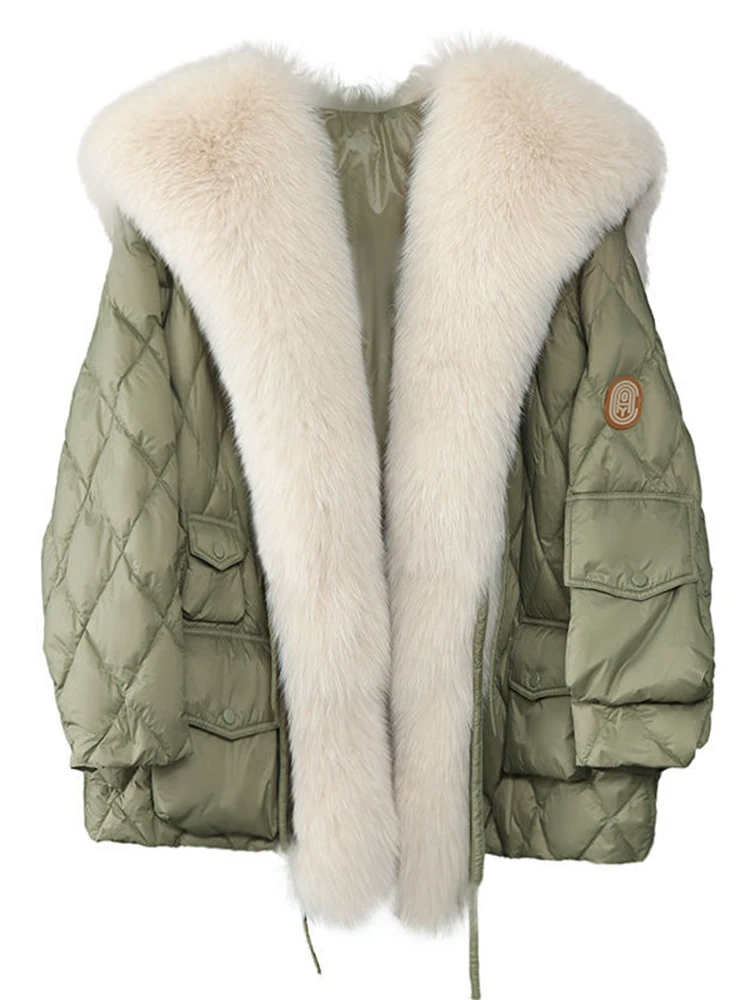 Stylish women's green fur collar jacket. Warm winter coat, ideal casual outerwear for fall fashion.