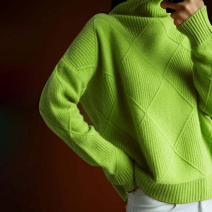 Cozy women's high-neck pullover sweater, a warm long-sleeve knit for winter comfort.