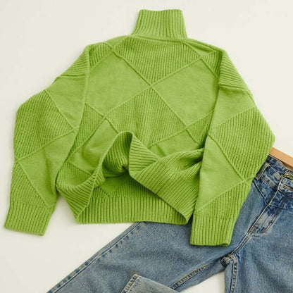 Chic women's high-neck sweater, a cozy knit pullover for stylish winter fashion outfits.