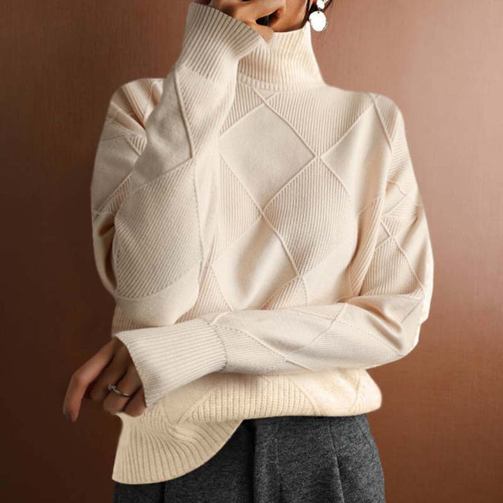 Soft knit women's high-neck pullover sweater, ideal for comfortable fall & winter outfits.