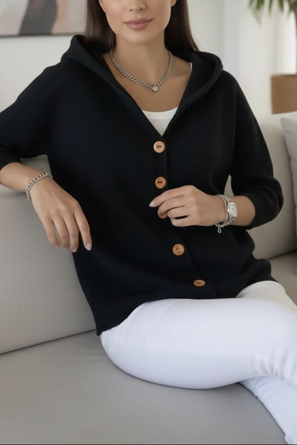 Plus size women's cozy hooded cardigan sweater, offering relaxed fit and versatile layering options.