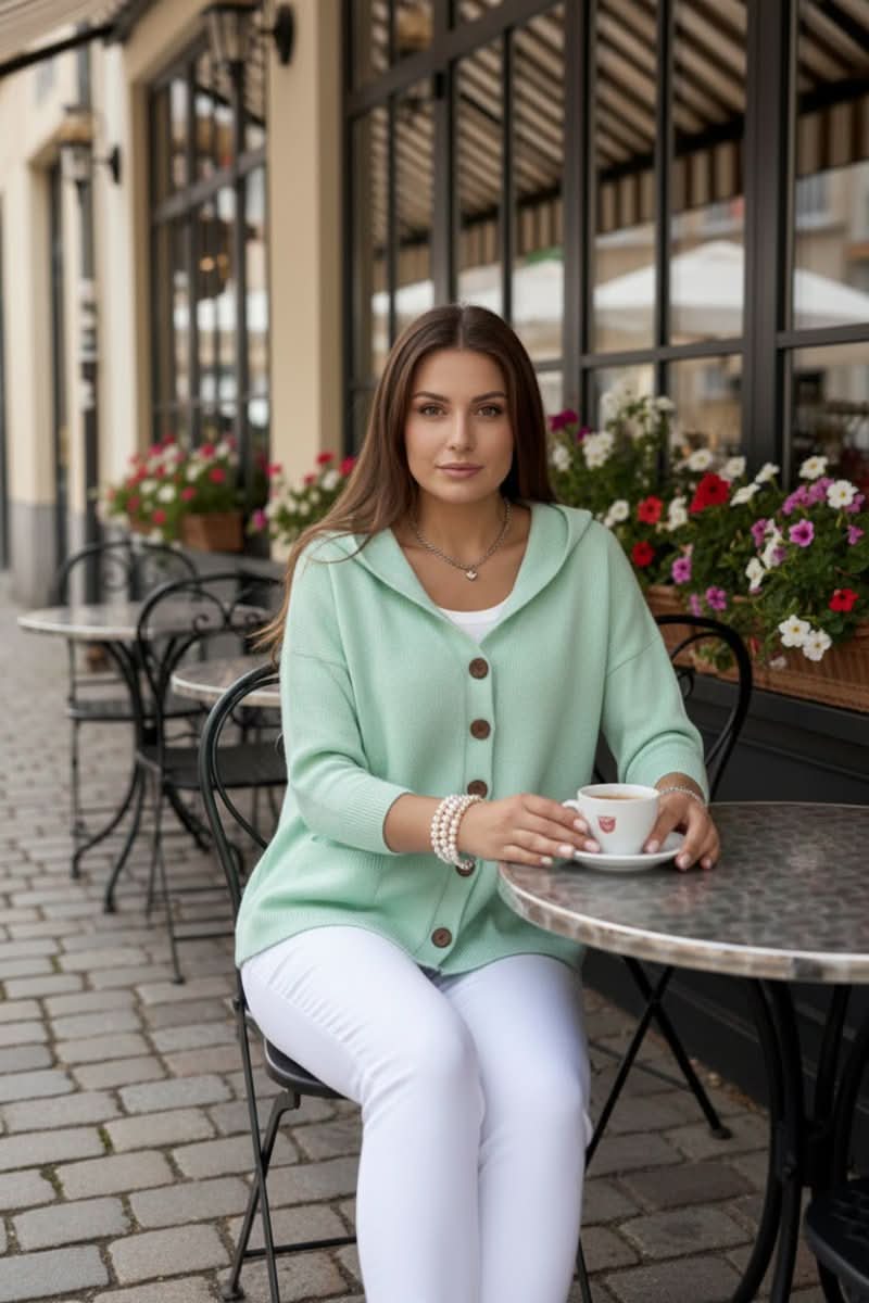Relaxed fit women's long sleeve hooded cardigan, a comfy knit for casual and chic layering.