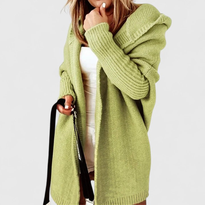 Stylish women's knee-length hooded open-front cardigan, an oversized & versatile piece for fall fashion.