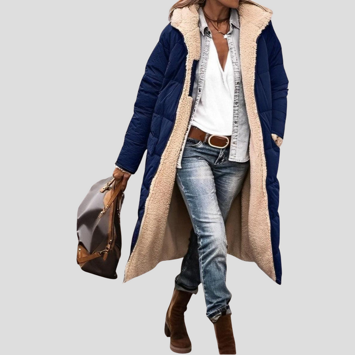 Reversible women's winter coat with a hood, offering two stylish looks for cold weather.