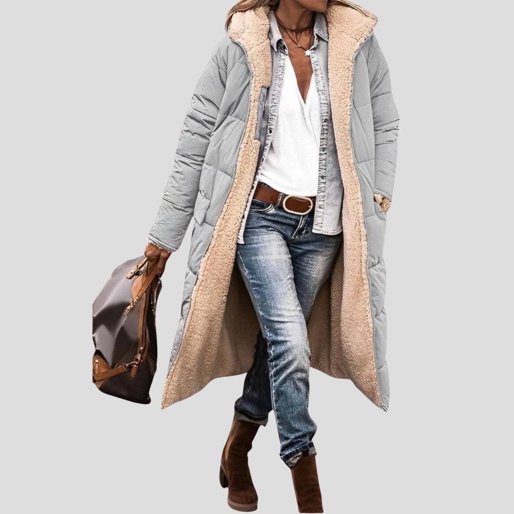 Warm and cozy women's hooded long coat, ideal outerwear for cold winter days.
