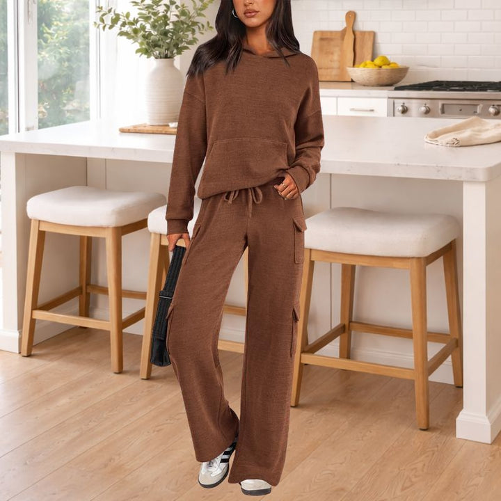 Elegant women's knit two-piece set: a comfortable hoodie & wide-leg trousers for luxurious loungewear.