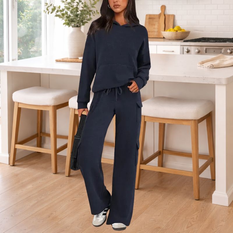 Relaxed fit women's knit loungewear: a cozy hooded top and wide-leg bottoms for ultimate comfort.