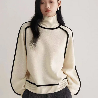 Women's cozy knit turtleneck pullover sweater in a loose fit, perfect for warm winter fashion & casual style.
