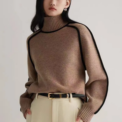 Warm women's turtleneck pullover sweater with a cozy knit texture and comfortable long sleeves. Ideal for winter.