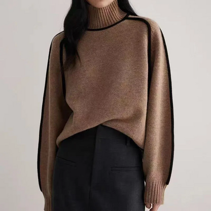 Soft, cozy knit women's turtleneck pullover sweater. A comfortable, loose fit top for everyday casual winter wear.