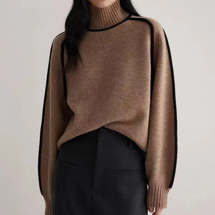 Soft, cozy knit women's turtleneck pullover sweater. A comfortable, loose fit top for everyday casual winter wear.