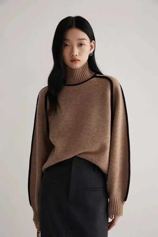 Stylish women's knit turtleneck with chic contrast seams for a modern fall fashion look. Versatile top.