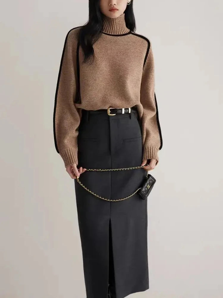 Relaxed fit women's knit turtleneck sweater, versatile for everyday or office casual. Cozy & chic apparel.