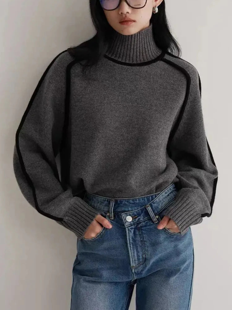 Effortless style: women's cozy knit turtleneck sweater, a chic addition to any versatile wardrobe.