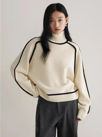 Cozy knit women's turtleneck sweater, ideal winter wear for warmth & style. Long sleeve, relaxed fit.