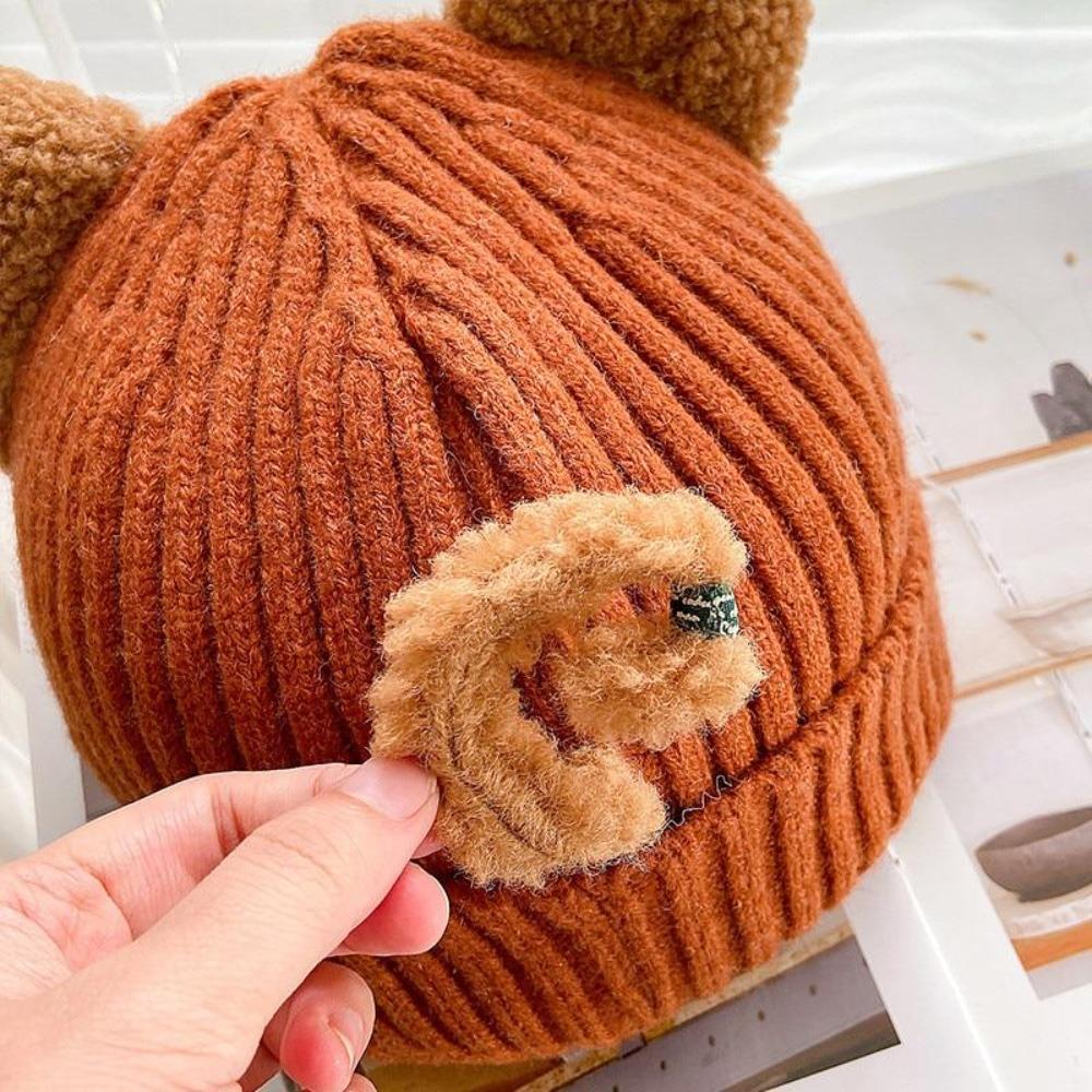 Cute cat ear women's knit hat provides warmth & style, perfect for winter's chill. A cozy fashion accessory.