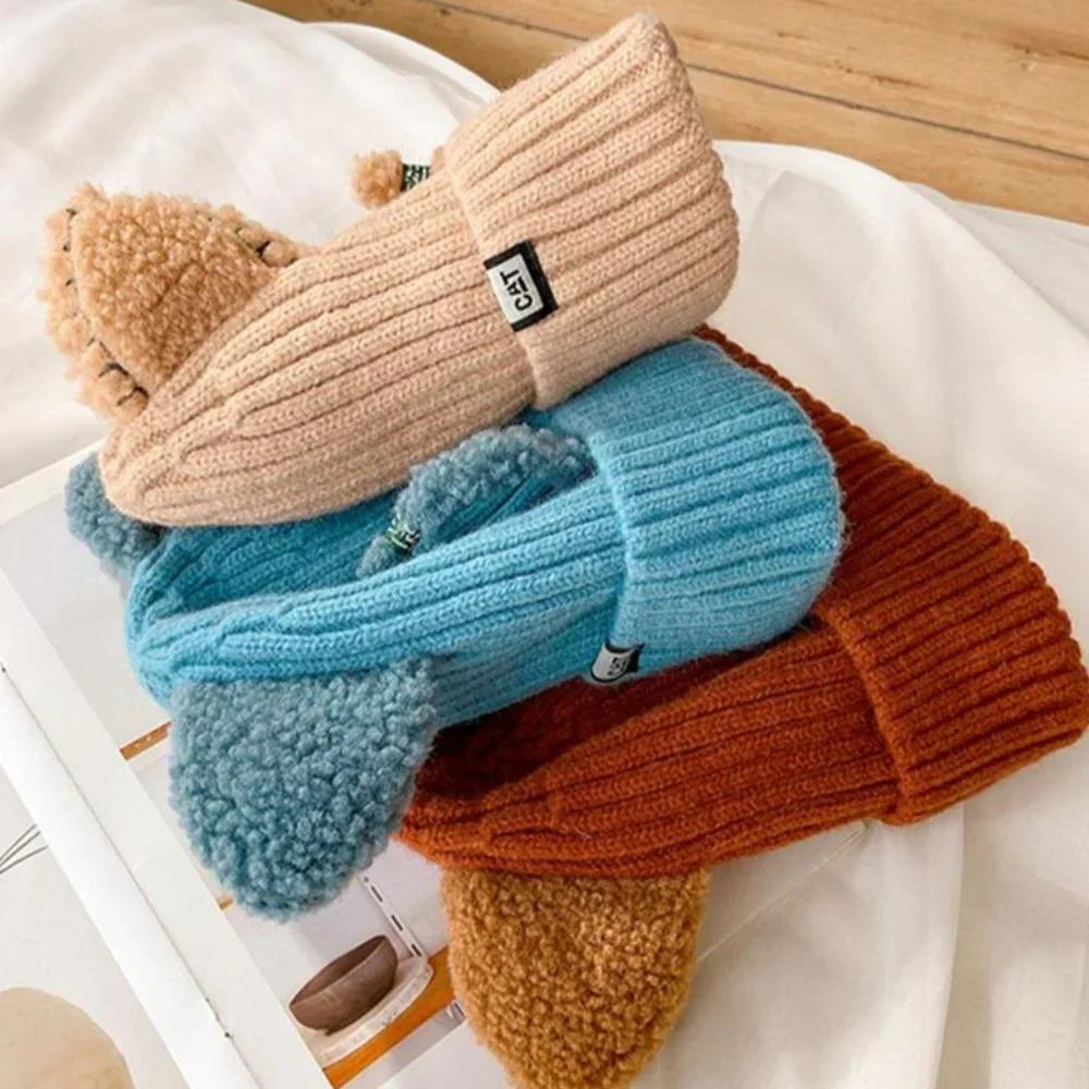 Cozy women's knit winter hat with fun cat ears for warmth and a stylish, playful cold weather look.