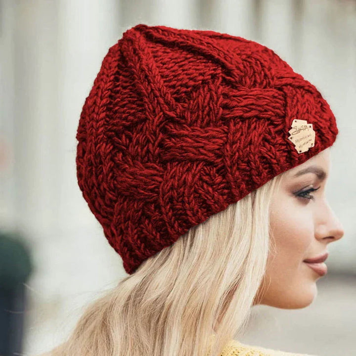 Fashionable women's chunky knit beanie. A warm and cozy winter accessory for any outfit.