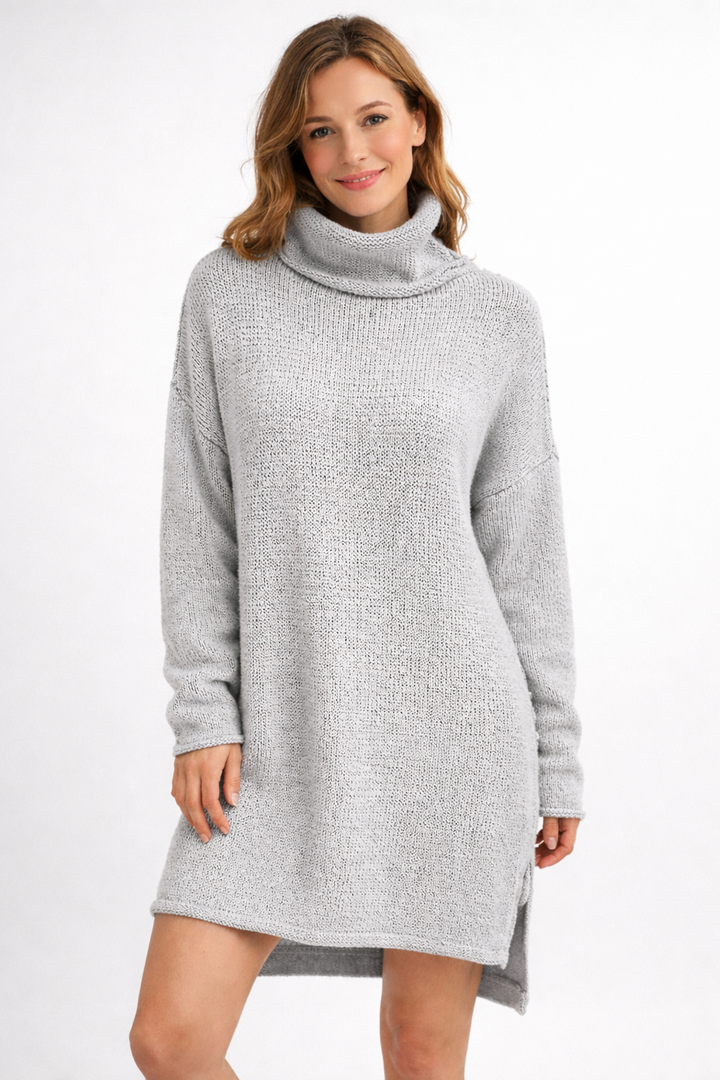 Elegant women's long knit turtleneck sweater for a cozy and warm feel. Essential fall & winter fashion.