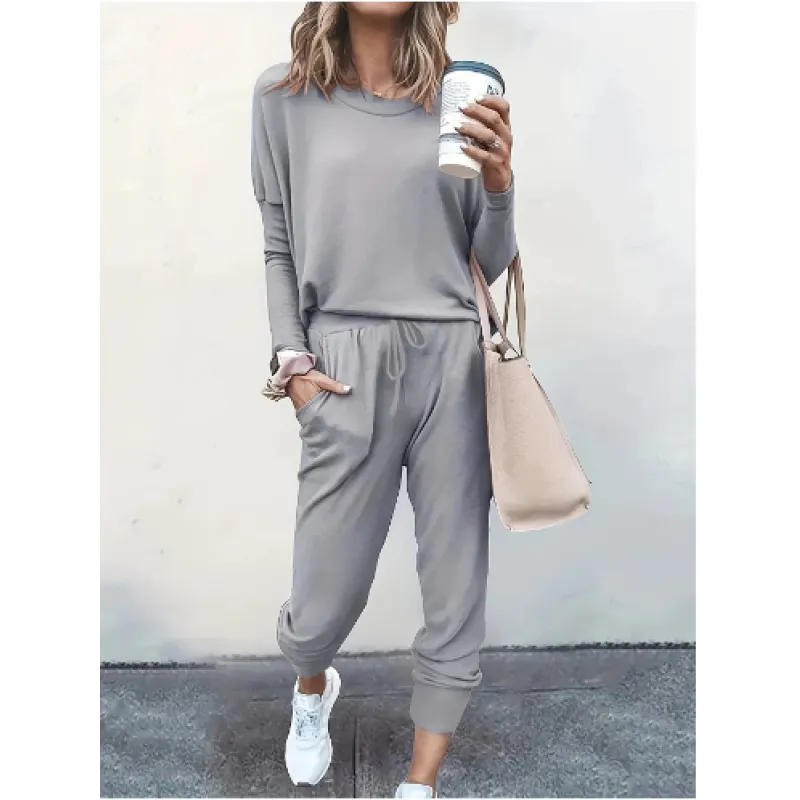 Chic women's lounge wear two-piece set featuring a warm crew neck & relaxed fit joggers.