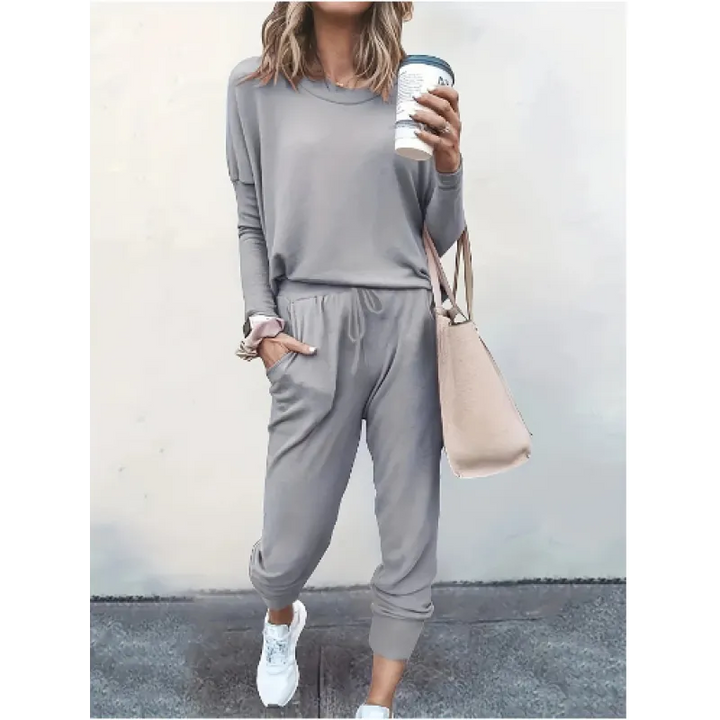 Chic women's lounge wear two-piece set featuring a warm crew neck & relaxed fit joggers.