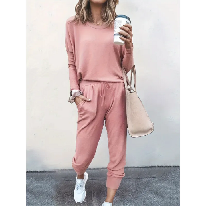Versatile women's cozy set including a crew neck top & jogger bottoms, great for home or casual outings.