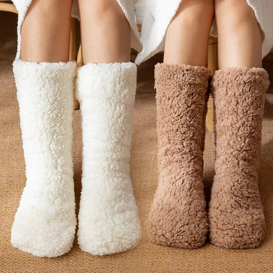 Women's cozy non-slip slipper socks for ultimate indoor comfort. Soft lounge wear footwear, perfect winter essential.