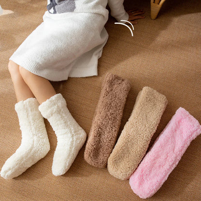 Warm women's slipper socks with non-slip grip, ideal for home comfort & lounging. Soft knit feel.