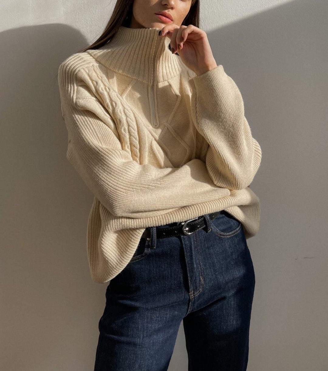 Relaxed fit women's oversized knit pullover sweater, offering cozy warmth and ultimate comfort for winter wear.