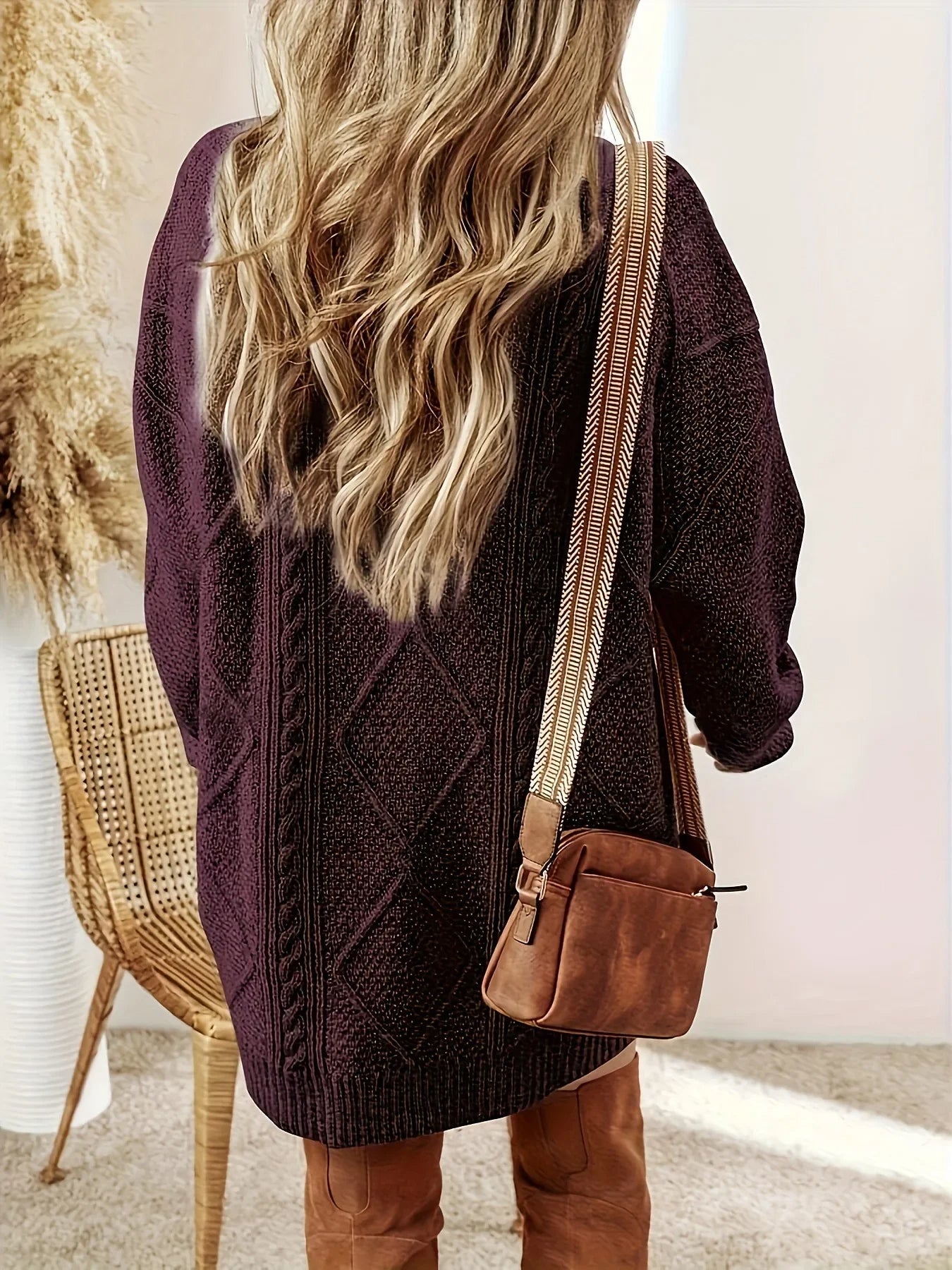 Stylish women's cozy long sleeve sweater dress, drop shoulder, versatile for any casual occasion.