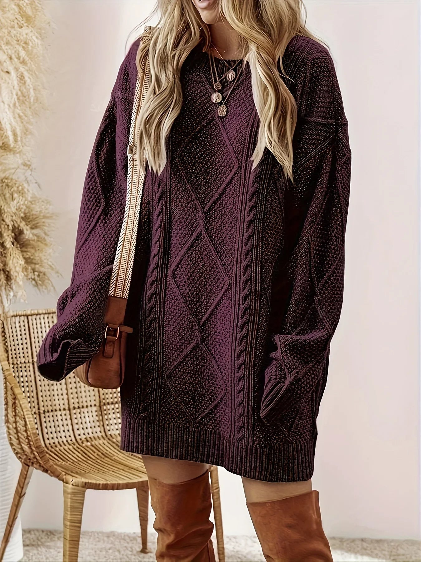 Relaxed fit women's winter sweater dress, oversized and cozy, with comfortable ribbed details.